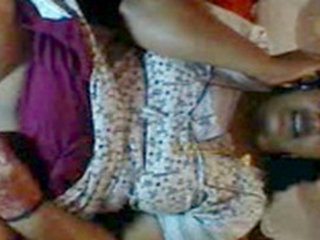 Indian auntie talks dirty on the phone while pleasuring herself