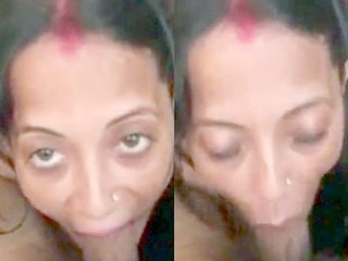 Professional Indian housewife expertly gives oral pleasure to a large black penis