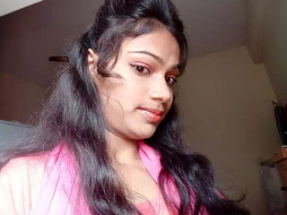 A Tamil woman bathes nude in this sensual recording