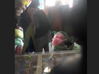 A sensual encounter in a retail setting