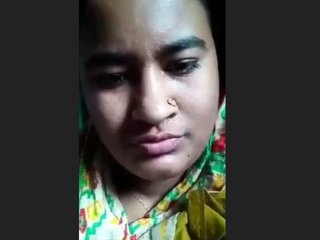 A young woman from a village entices her partner in an erotic recording