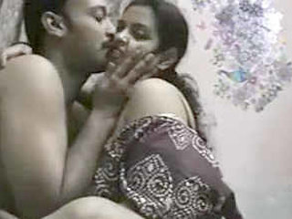 Indian curvy wife caught enjoying herself while watching TV