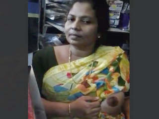 Indian housewife reveals her intimate parts to her companion in a store