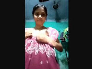 Stunning woman showcases her large breasts