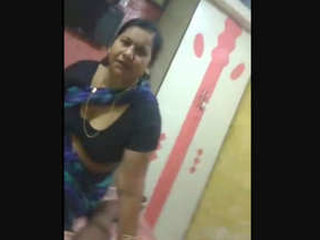 A mature woman from an Indian village gives oral pleasure to her son's friend