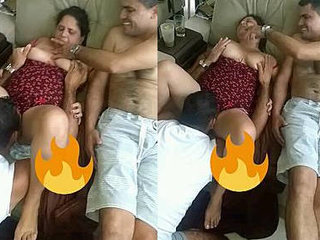 Two young men have a sexual encounter with an older woman