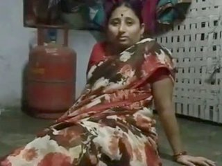 Sailaja, a seasoned Indian MILF, in explicit action