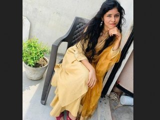 A stunning dark-haired woman and her partner savor the joys of intimacy