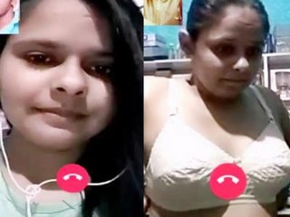 A South Asian woman with large breasts from her office engages in inappropriate behavior