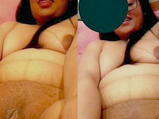 Indian beauty pleasurefully rubs herself with a bottle