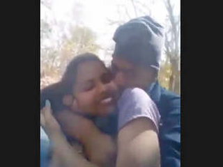Passionate couple engages in outdoor sex in the woods