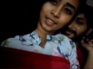 Aroused man massages breasts and buttocks of adorable girl