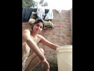 Village beauty bhabi goes topless while bathing