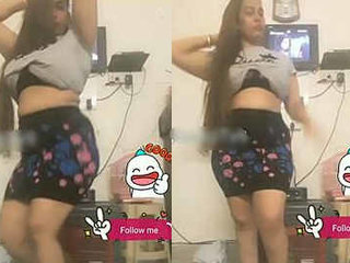 Desi wife with large breasts jiggles and dances with her butt