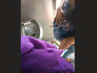 Discreetly taped couple engaging in sexual activity on a train's restroom caught by fellow passengers