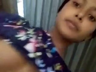 A cute Desi girl reveals her big boobs and moist pussy