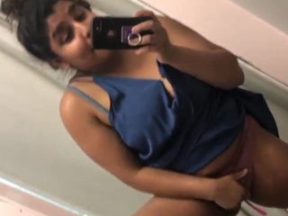 Aroused female stimulating herself with her fingers