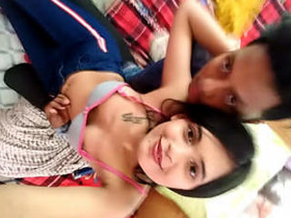 Romantic couple embraces with breast contact