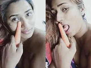 Indian beauty Swathi Naidu pleasuring herself with a carrot