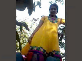 A South Asian couple enjoys oral and intercourse in a wooded area with sound recording