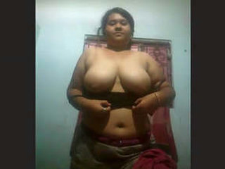 Boudi, the attractive dairy farmer, records a sensual film for her significant other