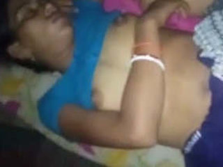 Husband secretly takes pictures of sleeping wife naked