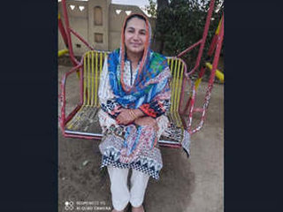 A husband records his wife undressing while watching a nude video