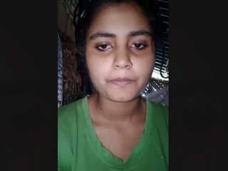 Arousing Indian woman reveals her breasts and moist vagina