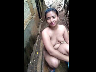 Indian wife's open-air nude bath secretly filmed