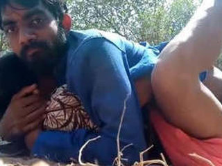 Indian village couple engages in open-air intimacy