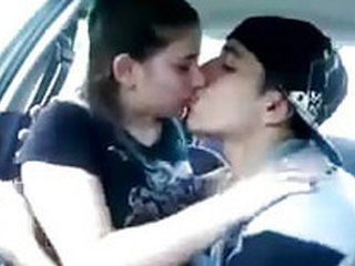 A pair enjoys kissing on the lips