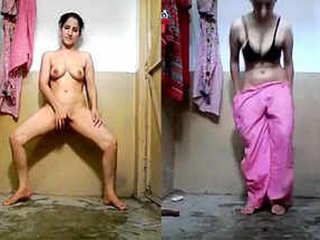 A girl pleasuring herself with her fingers in the restroom