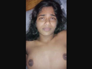 A stunning woman vigorously penetrates a smooth vagina