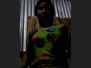 Classic girl from yesteryear dons an outfit and flaunts it in a countryside setting.