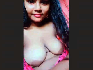Desi beauty undresses and poses seductively