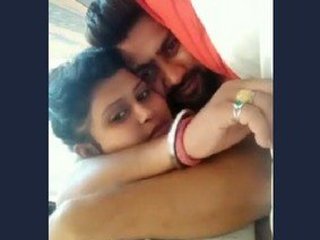 Stunning mature beauty with enormous breasts enjoys intimate moments with younger lover in this captivating video