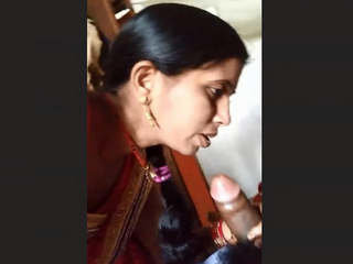 Seductive Indian bhabi performs a sensual oral sex act