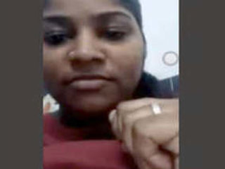 Tamil girl pleasures herself on video call with fingering