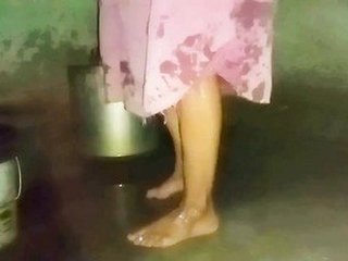 Indian aunty takes a bath in her home