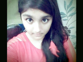 Amateur college girl flaunts her big tits in a seductive video