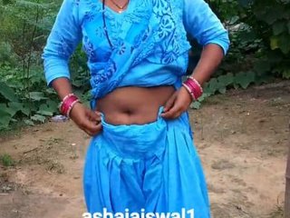 Desi bhabi relieves herself in a village setting