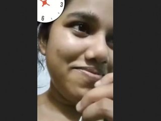 Watch a stunning girl flaunt her large breasts in a steamy video