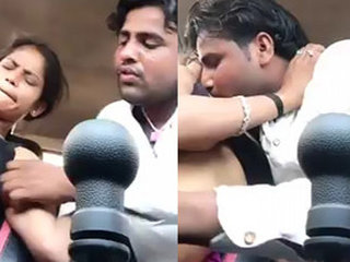 Desi couple sucks boobs in car
