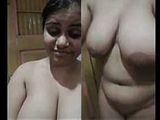 Indulge in the erotic world of aunty's nude show