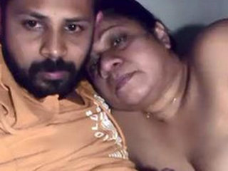 Lovely middle-aged couple in steamy video