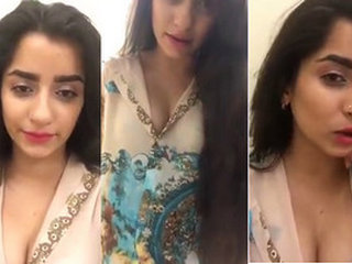 Sultry Indian girl pleasures herself in front of camera while talking to fans