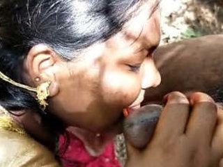 Desi wife in saree gives a blowjob to her husband in public