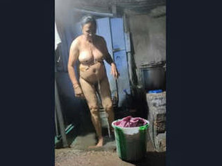 Indian bhabhi takes a bath in front of the camera