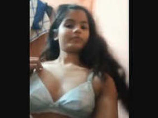 Busty teen gets her boobs fondled in a steamy video