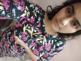 Busty girl plays with her wet pussy on camera